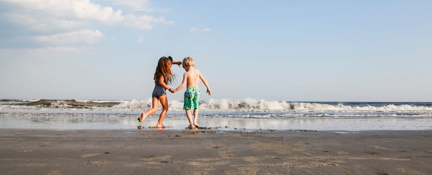 Family on beach near charleston